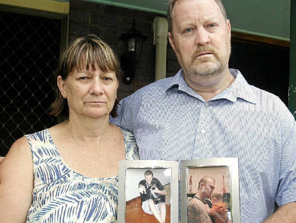 GRIEVING AND ANGRY: Chris and Gary Parsons with a photo of their son Keiran. GRIEVING AND ANGRY: Chris and Gary Parsons with a photo of their son Keiran.
